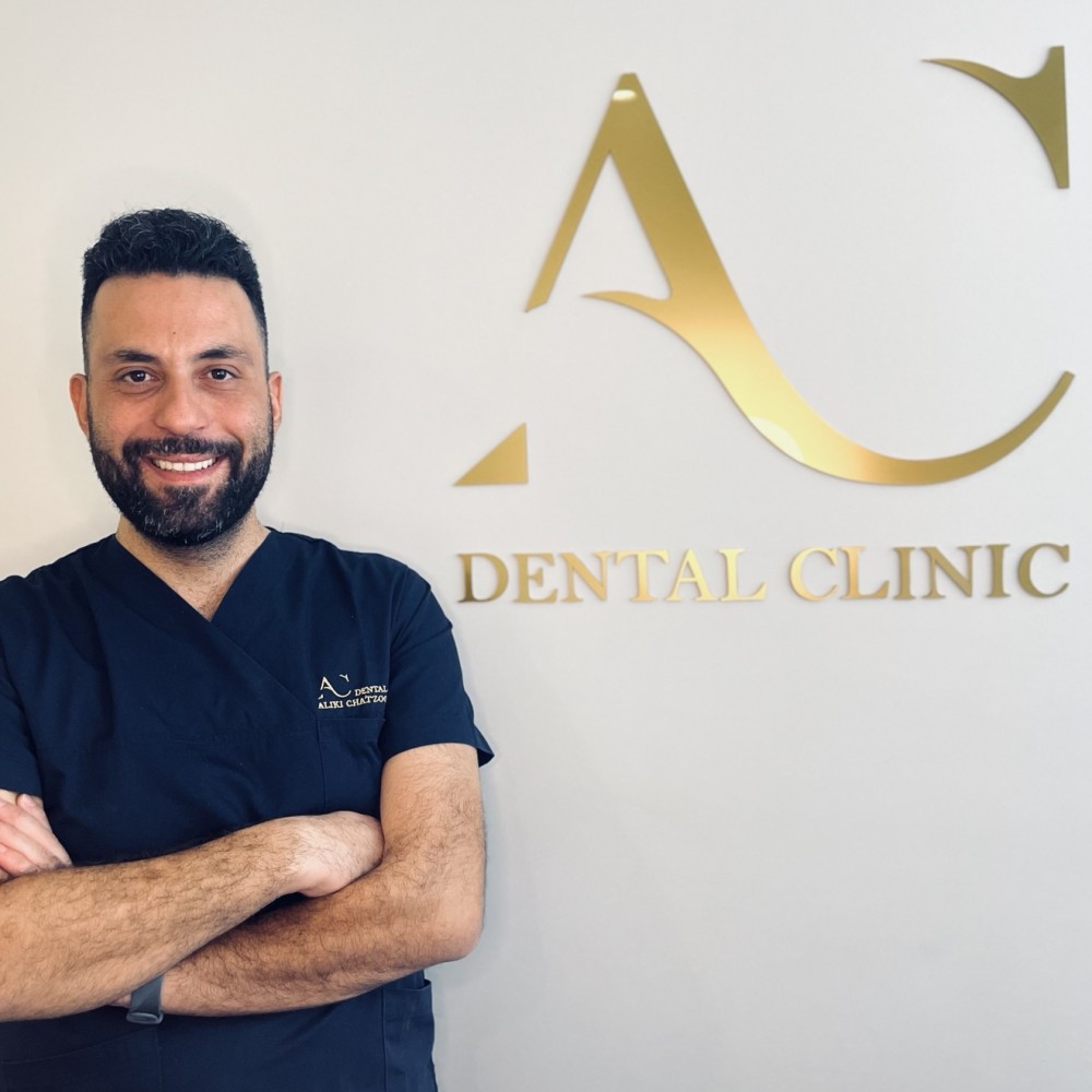    Dr  Emmanouel   Arvanitis , DDS                      